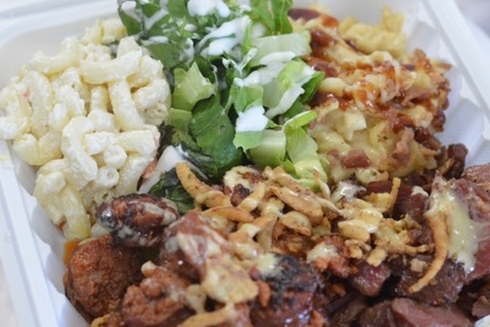 Smoked bacon over creamy mac and cheese, signature side at Big Island Smokehouse