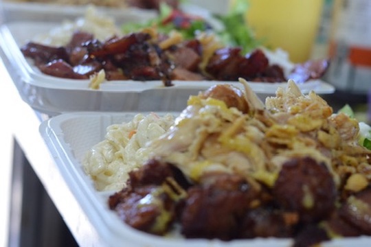 Multiple plate lunches lined up at the Big Island Smokehouse food truck, Hilo Hawaii BBQ catering