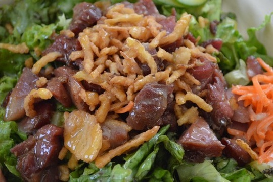 Smoked meat salad with pickled carrot and crispy onions, Big Island Smokehouse macro shot